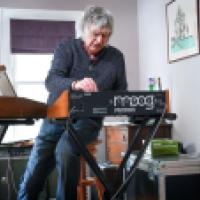 Trevor Pinch playing his Moog synthesizer 
