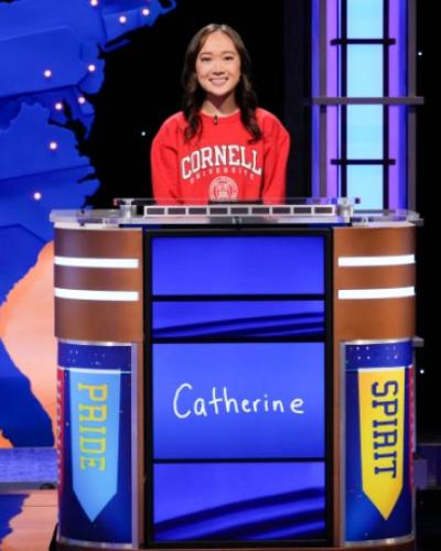 Catherine Zhang in the Jeopardy TV set